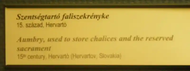 Overlapping circles forming a cross design on an aumbry